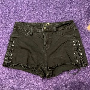 Black Jean shorts with open sides